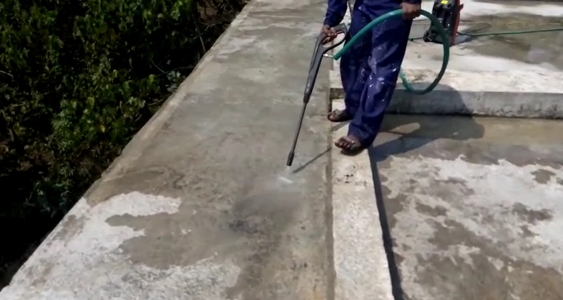 Jet washing in progress before waterproofing application